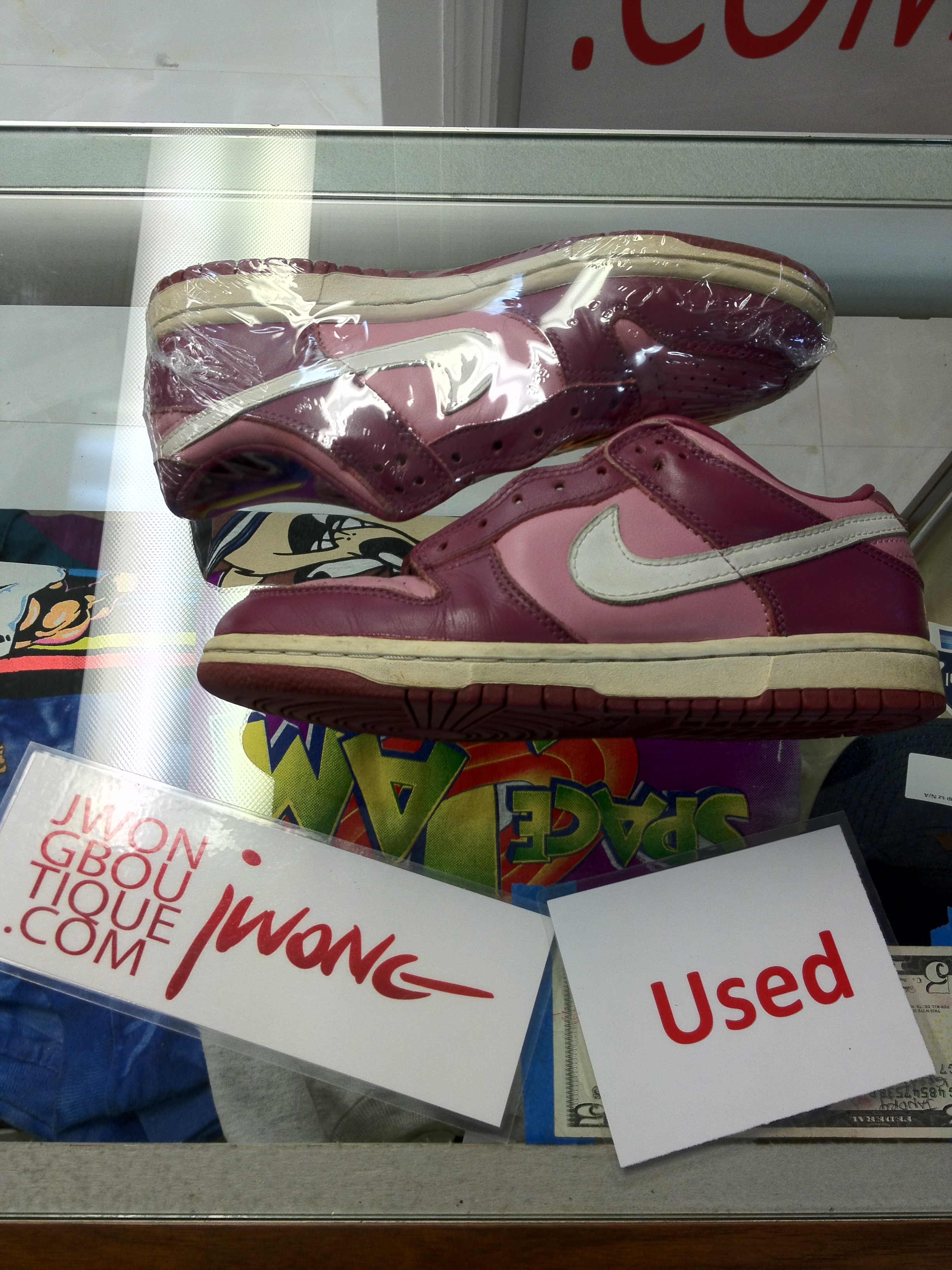 pink and white low top dunks