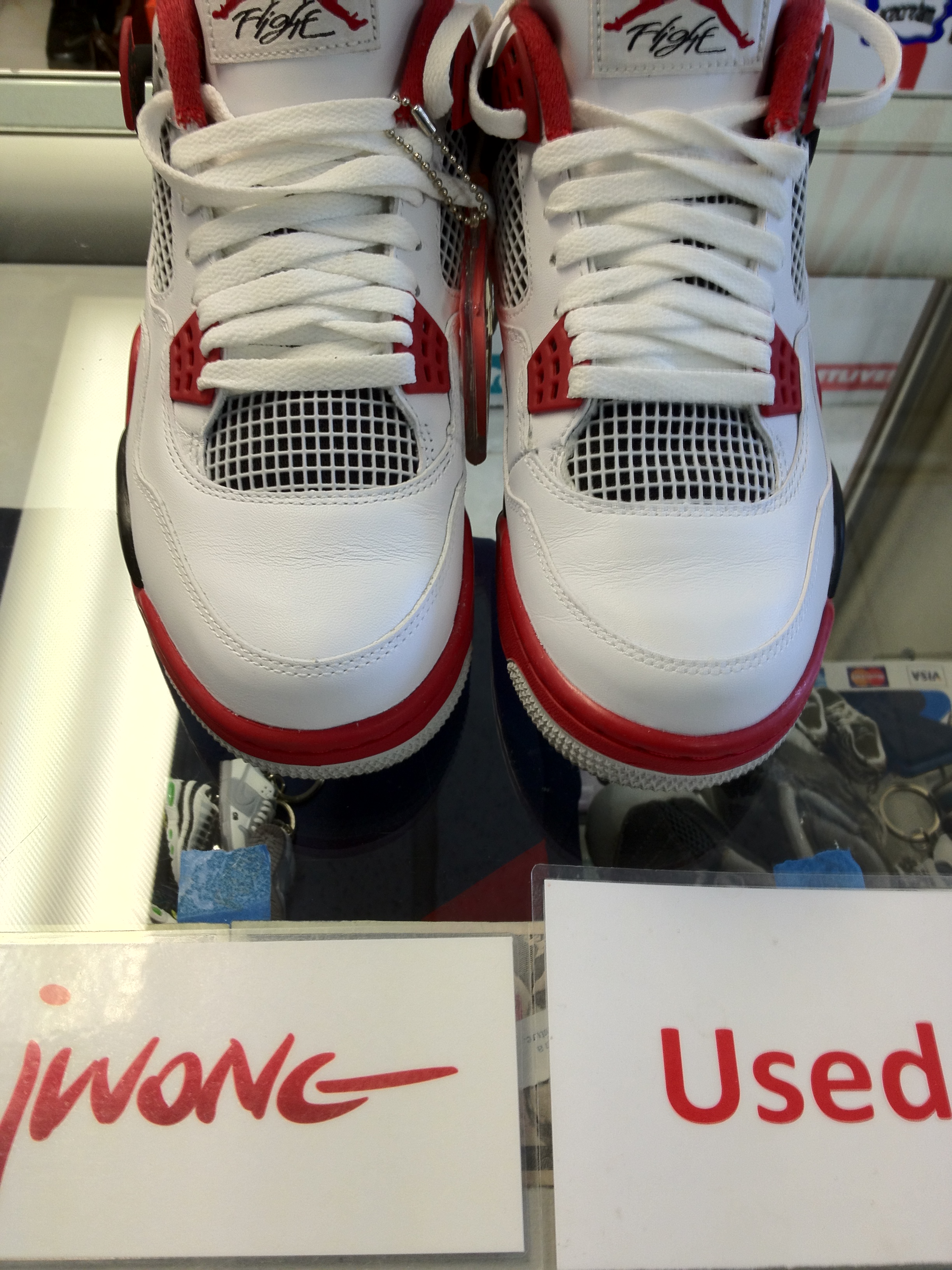 air jordan 4 fire red fake vs real