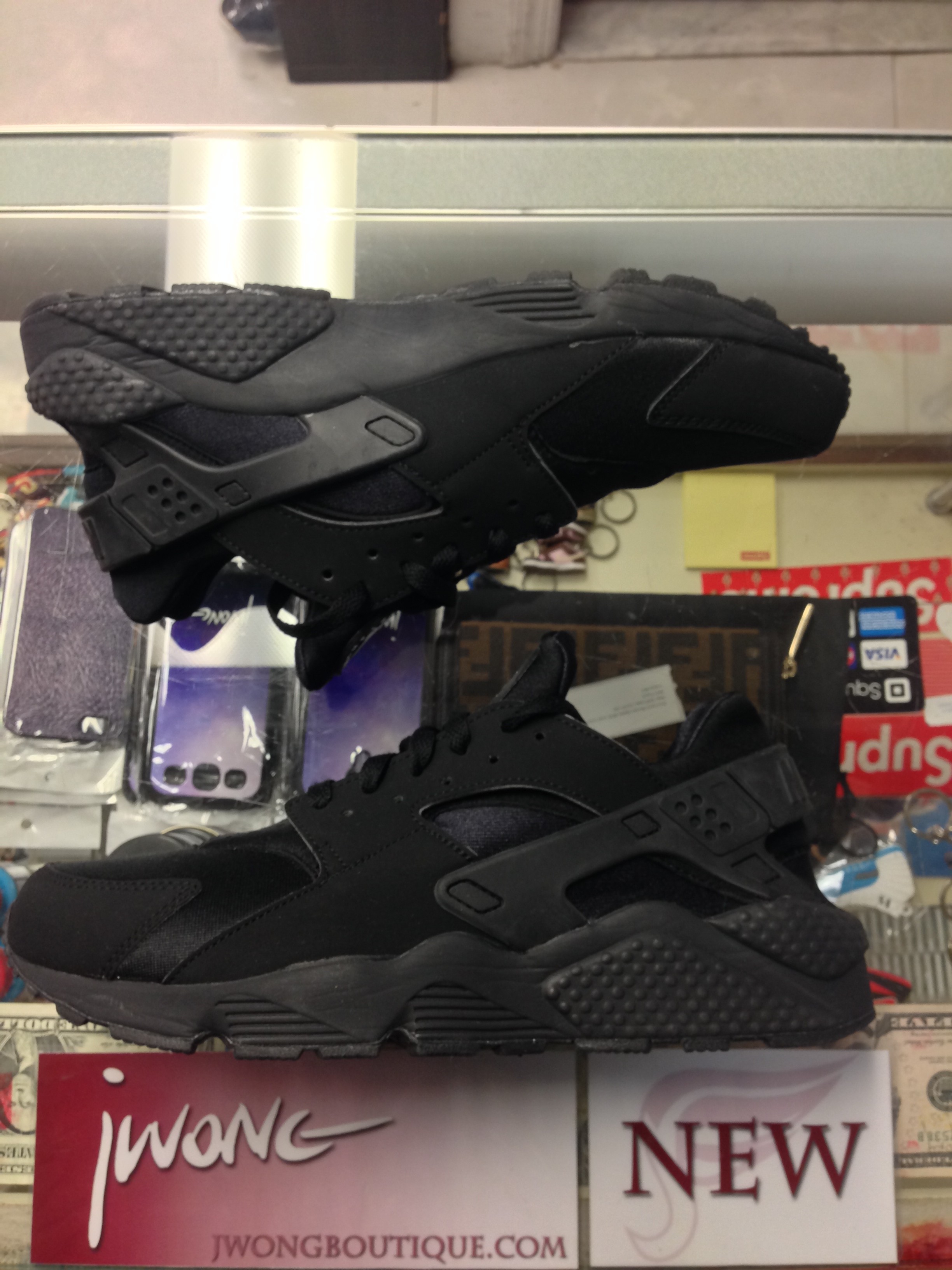 nike air huarache triple black mens